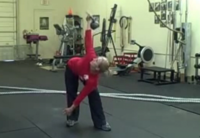 Woman doing kettlebell training for fat loss